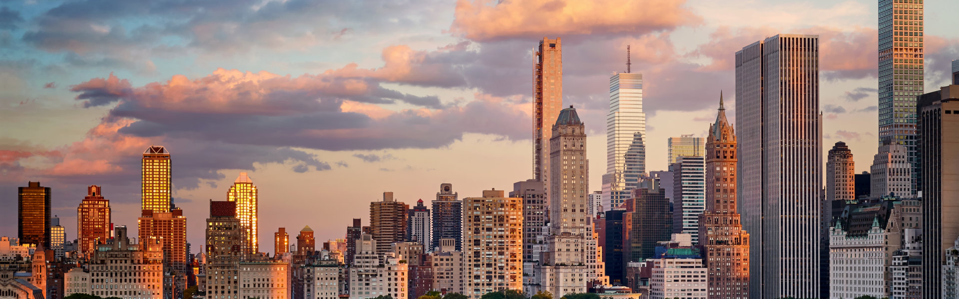 New York City Upper East Side skyline over the Central Park at sunset, USA.